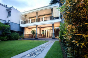 Гостиница Wingsu Guest House  North Kuta